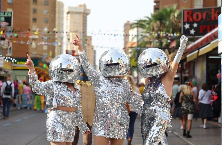 Watch as 30,000 Benidorm Brits take to streets & march in fancy dress to raise funds for horror Spain storm victims