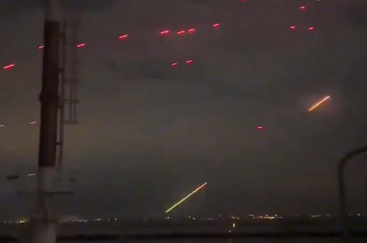 Watch heart-stopping moment Ukrainian anti-air guns light up the sky blasting Russian drone swarm attacking Odesa