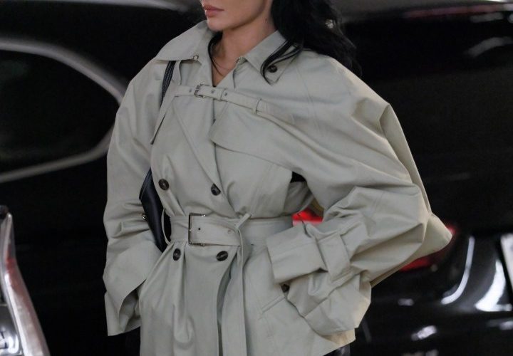 Kylie Jenner looks incredible as she’s spotted out in black boots, a trench coat and glasses