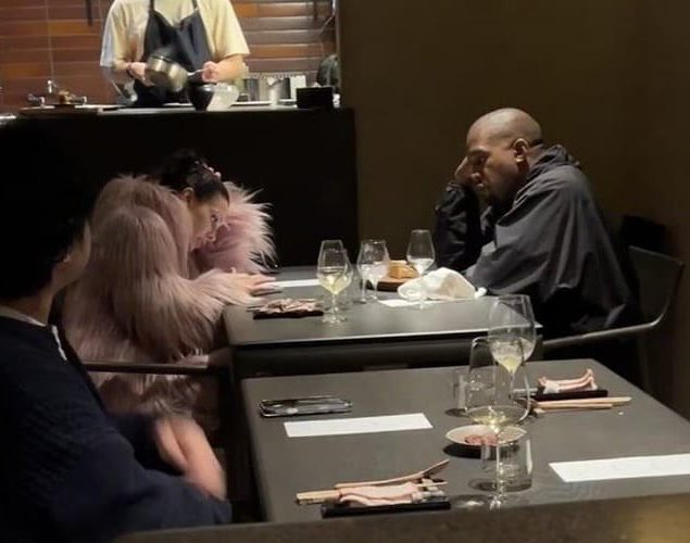 Bianca Censori rocks massive pink fur coat during tense dinner with Kanye West in Tokyo amid his legal issues