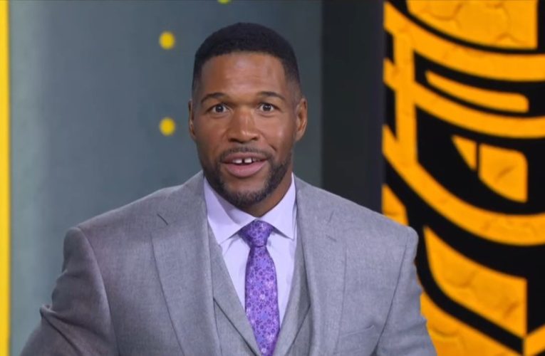 Michael Strahan tells Erin Andrews ‘you’re looking fresh’ as he compliments her outfit choice on Fox NFL Sunday