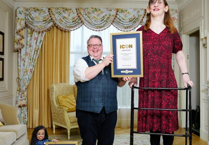 World’s tallest woman at 7ft towers over world’s SHORTEST as pair meet for tea… with more in common than you’d think