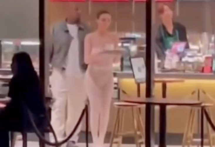 Bianca Censori goes pantless in just see-through white tights on coffee run with Kanye West in Tokyo