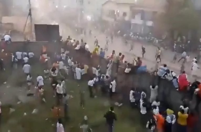 Fears up to 100 people dead in horror crush at football match in Guinea as shock footage shows fans trying to escape