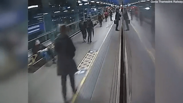 Moment passenger nearly dragged to his DEATH by train pulling into station as horrified travellers helplessly watch