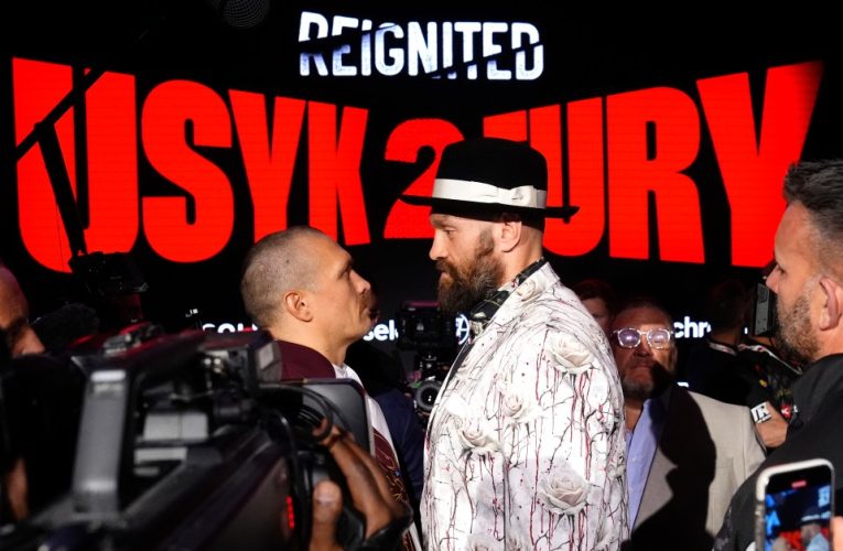 Tyson Fury and Oleksandr Usyk separated by security after neither boxer refused to move for over TEN MINUTES