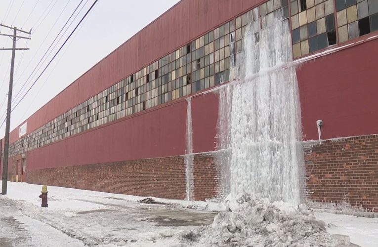 Frigid temps, broken pipes create ice waterfall at Detroit warehouse